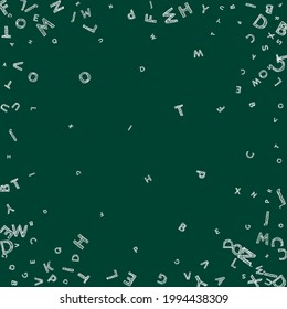 Falling letters of English language. Chalk handdrawn flying words of Latin alphabet. Foreign languages study concept. Bizarre back to school banner on blackboard background.