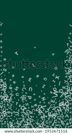 Falling letters of English language. Chalk handdrawn flying words of Latin alphabet. Foreign languages study concept. Terrific back to school banner on blackboard background.