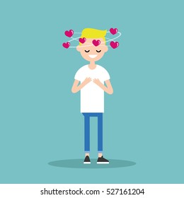 Falling in love conceptual illustration. Young blond boy with hearts spinning around his head / flat editable vector illustration, clip art