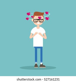 Falling in love conceptual illustration. Young nerd with hearts spinning around his head / flat editable vector illustration, clip art