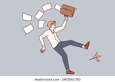 Falling man office employee slipped on banana peel and scattered documents from briefcase. Unfortunate guy slipped due to leftover food lying on ground and risks getting leg or head injury