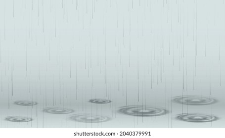 falling rain drops on ground with ripples