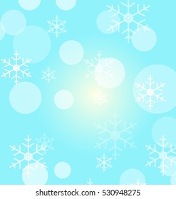 Falling snow and bokeh on blue background.