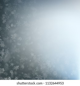 Falling snow flakes on a blurry gray blue background. EPS 10