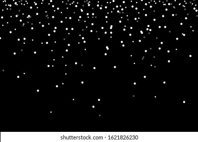 Falling snow isolated on black background