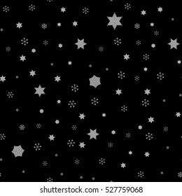 Falling snow. Seamless winter background with snowflakes. Snowfall on a black background.