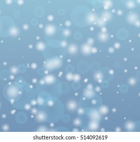 Falling snow vector seamless pattern. White splash on blue background. Winter snowfall hand drawn spray texture.