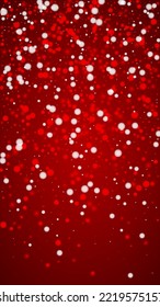 Falling snowflakes christmas background. Subtle flying snow flakes and stars on christmas red background. Beautifully falling snowflakes overlay. Vertical vector illustration.