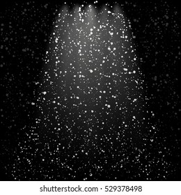 Falling snowflakes on black background