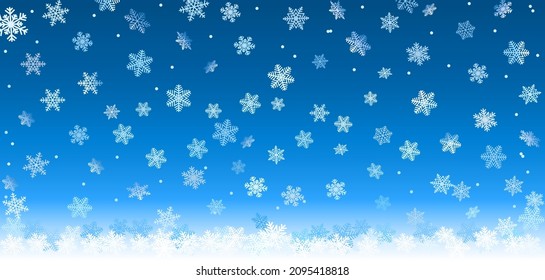 Fallende Schneeflocken auf blauem Hintergrund.