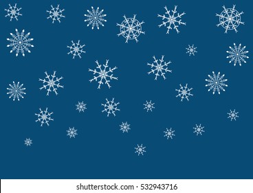 falling snowflakes on blue background