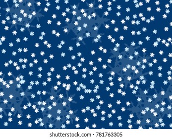 falling snowflakes, small and large on a blue background