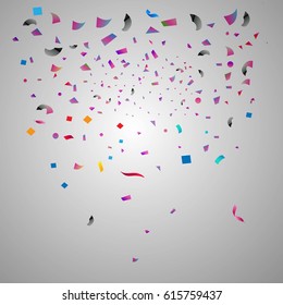 Falling tiny colorful confetti on glowing background and copy space for celebration party holiday decoration.Texture for you design birthday and Christmas and new year.