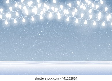 Falling white snow with blue winter sky and glowing garland. Merry Christmas and New Year background, banner, poster, card. Holiday backdrop style with fall shining snow and slight bulb.
