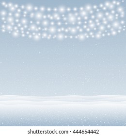 Falling white snow with blue winter sky and glowing garland. Merry Christmas and New Year background, banner, poster, card. Holiday backdrop style with fall shining snow and slight bulb.