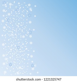 Falling white snow on  light blue background. Christmas background. Winter pattern with snowflakes and snowfall. Vector illustration.