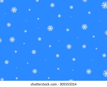 Falling white snowflakes in the sky on a blue background