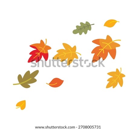 Falling yellow and orange leaves in the air. Autumn mood, arrival of fall.