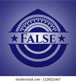 False badge with denim background