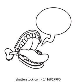 false mechanical chattering jaws with teeth and tongue with speech bubble icon cartoon black and white vector illustration graphic design