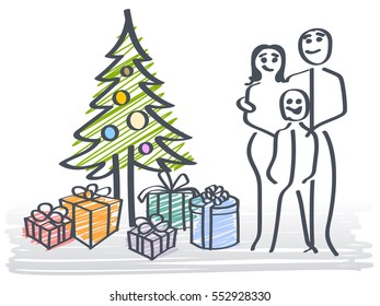 Family beside a Christmas tree