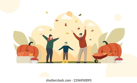 A family celebrates a moment of happiness in autumn