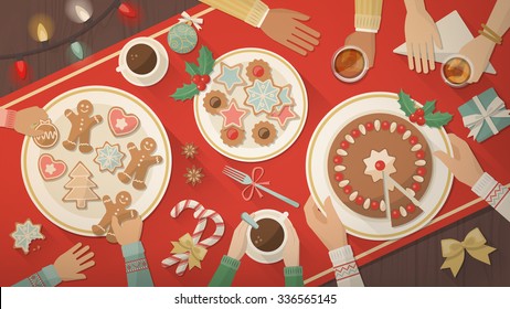 Family celebrating Christmas at home and eating together delicious sweets, cookies and desserts, top view