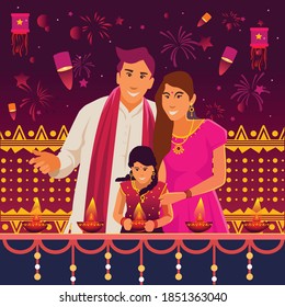 A family celebrating Diwali. A child and parents with candles and Diwali decorations and fireworks.