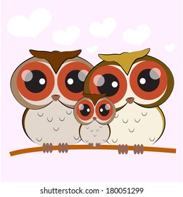 family consists of three owls perch on a branch