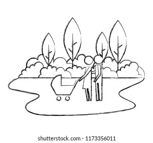 family couple with baby cart in landscape