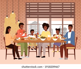 The family dines with healthy food in the restaurant. Relatives eat natural fresh products. Afro american people having dinner in the loft-style cafe. Table with fruit, salad and sandwiches