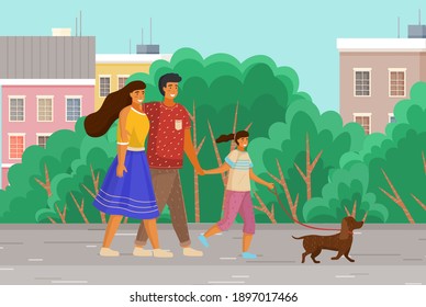 Family with a dog is walking on the street. Relatives with a pet spend time outdoors. The owners with the animal together on a leash in the park. Parents walk by the hand with their daughter