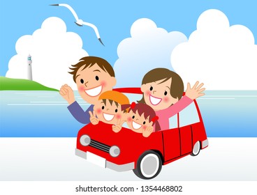 Family driving along the coast