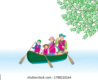 A family of four enjoying canoeing down the river