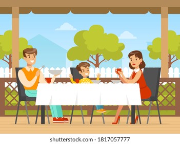 Family Having Dinner on Terrace, Mother, Father and Son Sitting at Table and Eating Outdoors Cartoon Vector Illustration