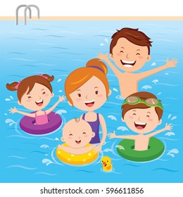 Family having fun in swimming pool