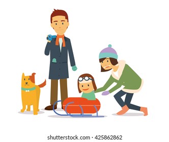 Family holiday in winter playing ski with dog