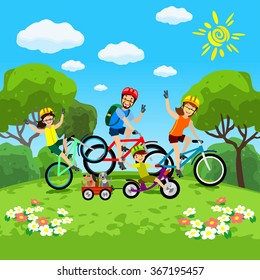 Family with kids concept of cycling in the park. Happy family riding bikes. The family in the park on bicycles