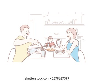 Family laughing around a good meal in kitchen. Hand drawn style vector design illustrations.