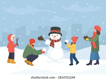 Familia haciendo snowman. Hombre, mujer y niños construyendo muñeco de nieve. Vacaciones de invierno con lugar para tu texto.