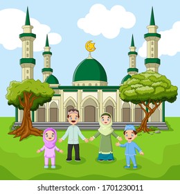 Family moslem standing in front of big Mosque