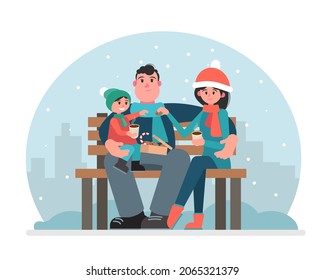 Family in the park drinking hot tea or coffee on the bench. Winter city park. Vector illustration in a flat style.