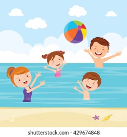 Family playing ball game in the sea. Happy family playing beach ball in the sea.