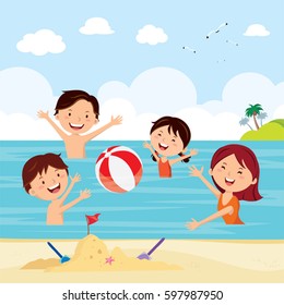 Family playing ball game in the sea