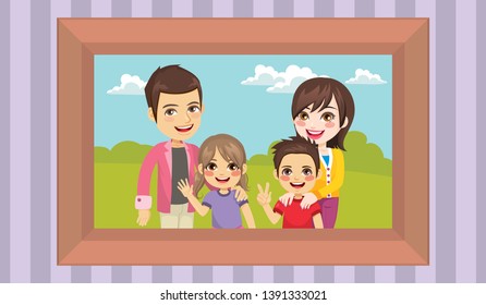 Family portrait in a frame on the wall mom dad and children happy posing together