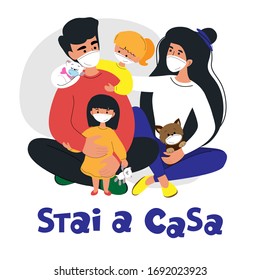 Family in protective masks at home and the inscription Stai a Casa. Quarantine concept. Stay home