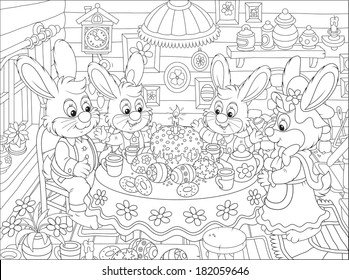 Family of rabbits celebrating Easter at the holiday table