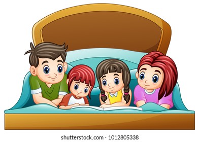 Family reading a book to two daughter on bed on a white background