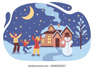 Family rejoices on Christmas night near the house Cheerful snowman in the yard. Winter scene with people outdoors