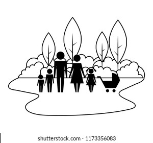 family silhouette and baby cart in landscape